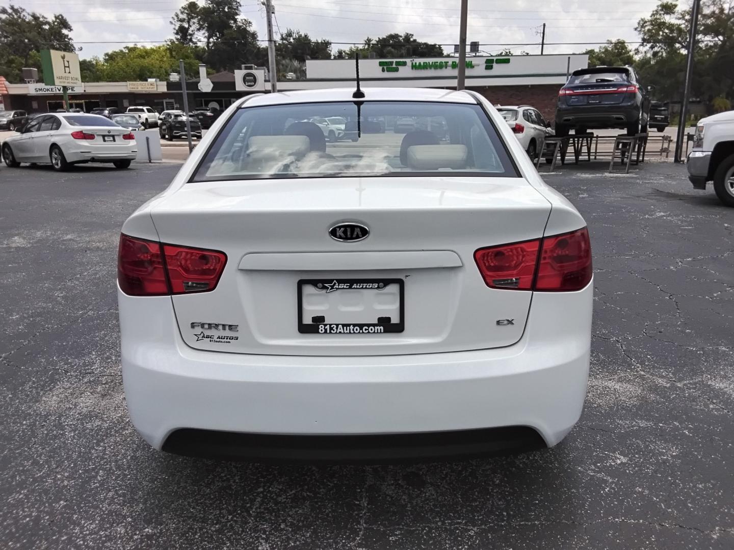 2012 White /Beige Kia Forte (KNAFU4A2XC5) , located at 6112 N Florida Avenue, Tampa, FL, 33604, (888) 521-5131, 27.954929, -82.459534 - $499 down plus tax & tag.- Photo#6