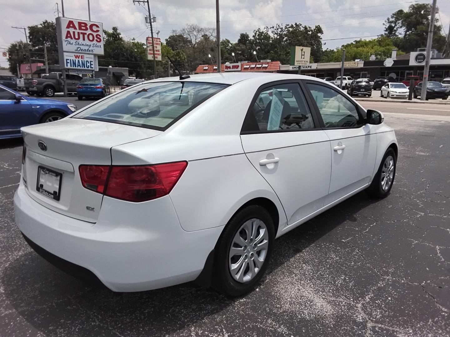2012 White /Beige Kia Forte (KNAFU4A2XC5) , located at 6112 N Florida Avenue, Tampa, FL, 33604, (888) 521-5131, 27.954929, -82.459534 - $499 down plus tax & tag.- Photo#5