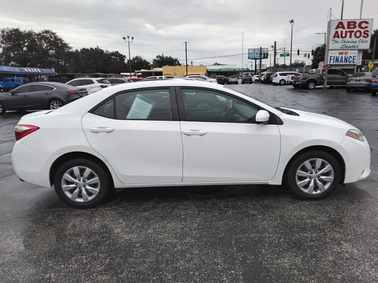 2015 White /Grey Toyota Corolla (2T1BURHEXFC) , located at 6112 N Florida Avenue, Tampa, FL, 33604, (888) 521-5131, 27.954929, -82.459534 - $499 down plus tax & tag.- Photo#2