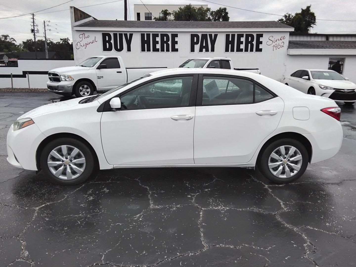 2015 White /Grey Toyota Corolla (2T1BURHEXFC) , located at 6112 N Florida Avenue, Tampa, FL, 33604, (888) 521-5131, 27.954929, -82.459534 - $499 down plus tax & tag.- Photo#0