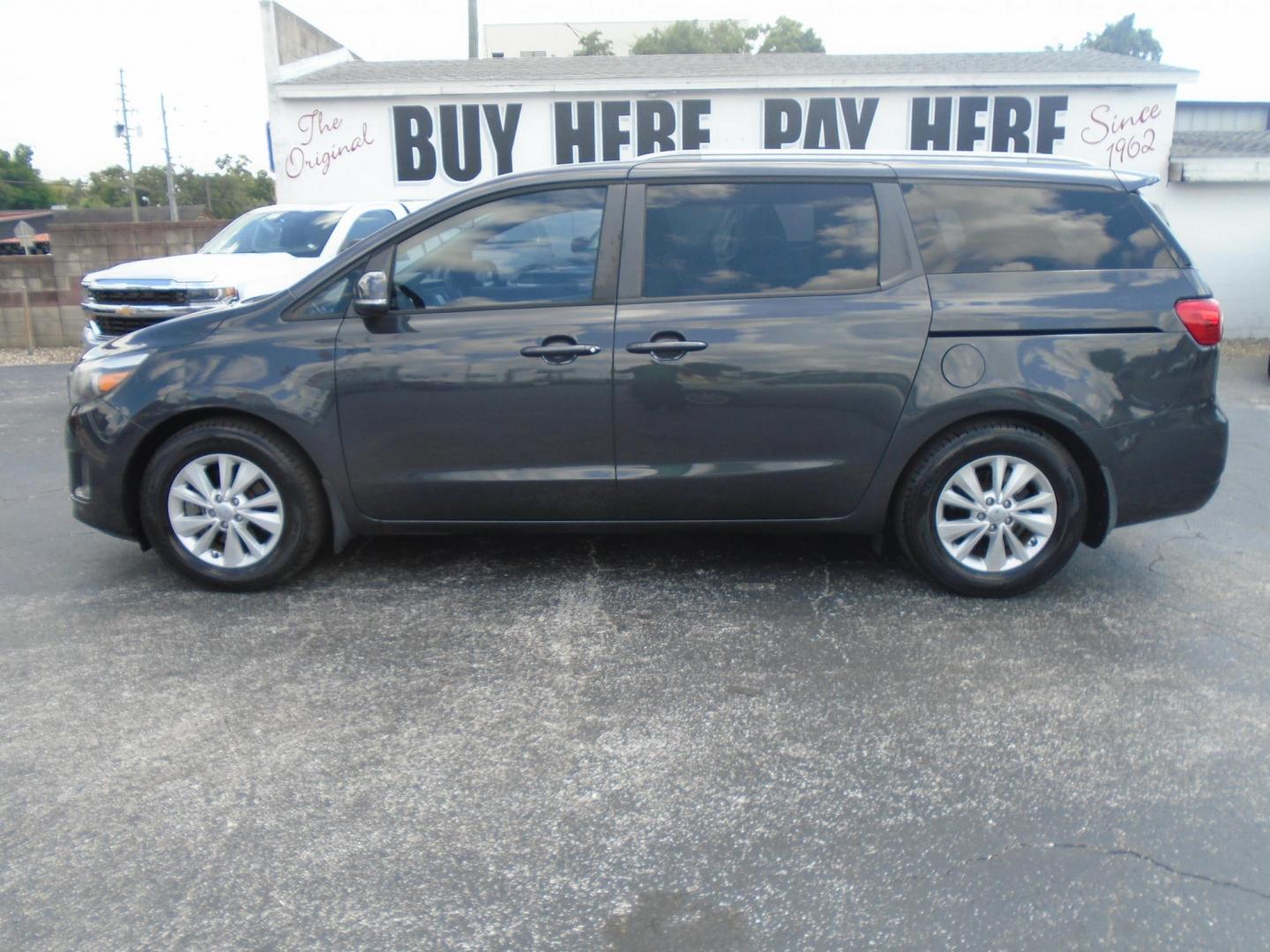 2016 Kia Sedona LX (KNDMB5C14G6) with an 3.3L V6 DOHC 24V engine, 6-Speed Automatic transmission, located at 6112 N Florida Avenue, Tampa, FL, 33604, (888) 521-5131, 27.954929, -82.459534 - Photo#0