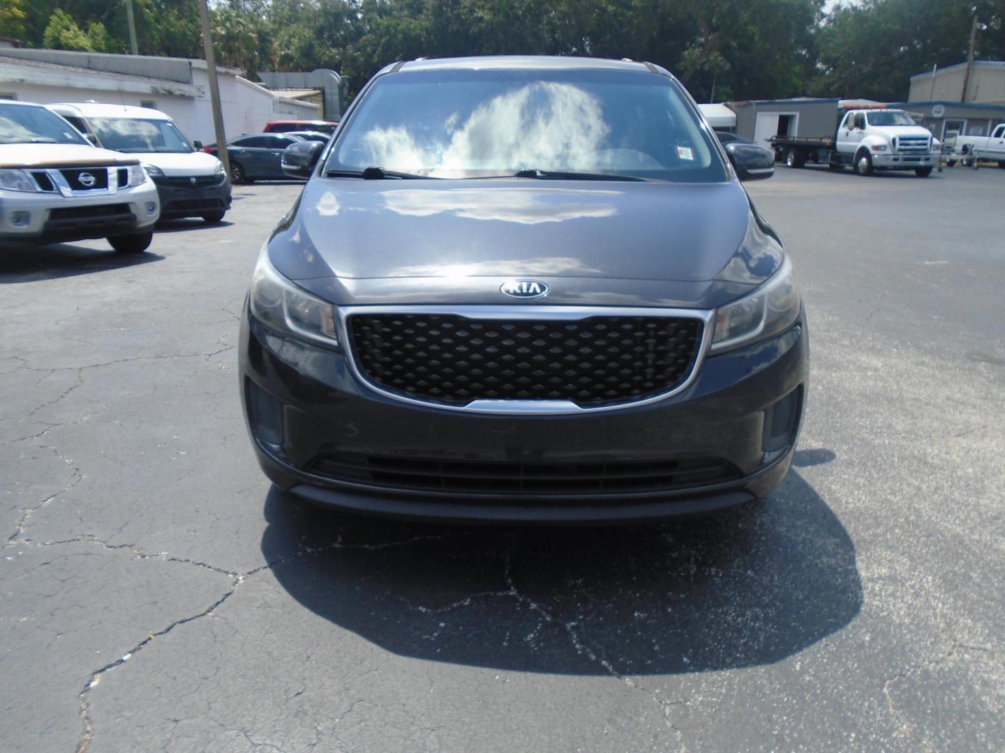 2016 Kia Sedona LX (KNDMB5C14G6) with an 3.3L V6 DOHC 24V engine, 6-Speed Automatic transmission, located at 6112 N Florida Avenue, Tampa, FL, 33604, (888) 521-5131, 27.954929, -82.459534 - Photo#2