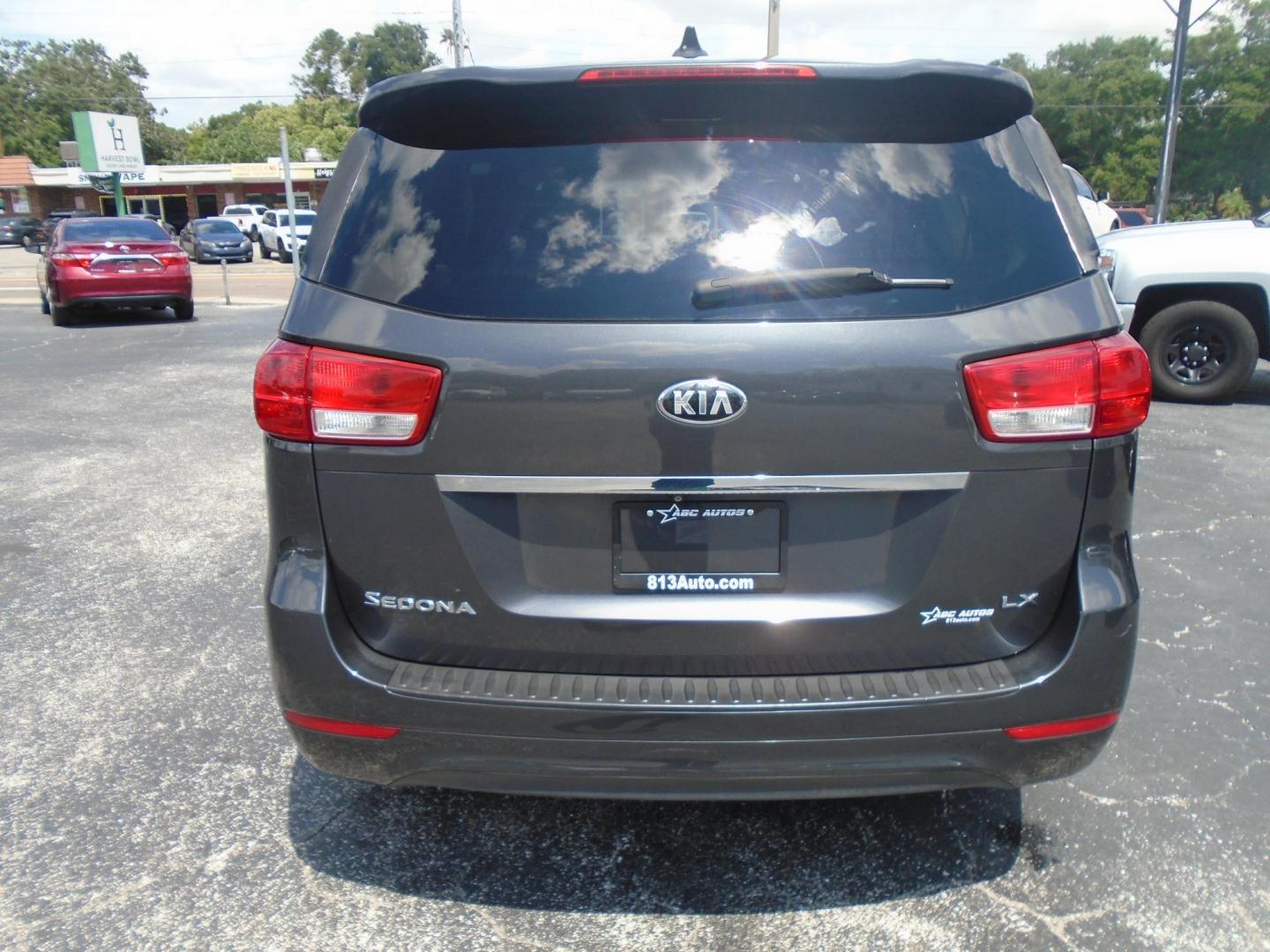 2016 Kia Sedona LX (KNDMB5C14G6) with an 3.3L V6 DOHC 24V engine, 6-Speed Automatic transmission, located at 6112 N Florida Avenue, Tampa, FL, 33604, (888) 521-5131, 27.954929, -82.459534 - Photo#5