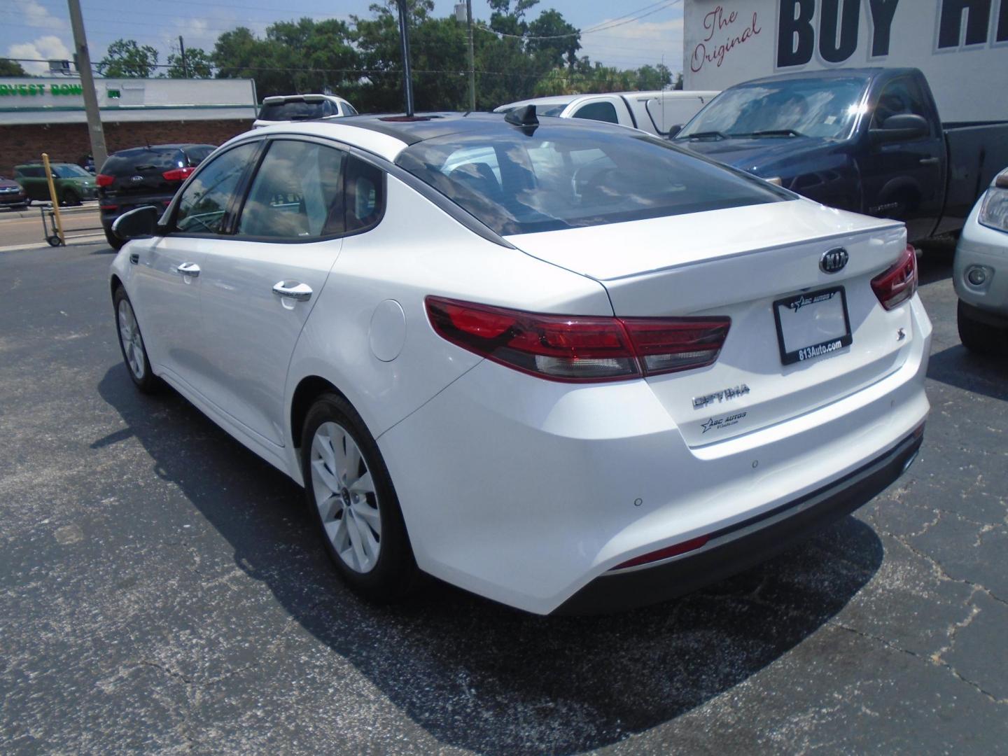 2018 Kia Optima LX (5XXGT4L39JG) with an 2.4L L4 DOHC 16V engine, 6A transmission, located at 6112 N Florida Avenue, Tampa, FL, 33604, (888) 521-5131, 27.954929, -82.459534 - Photo#5