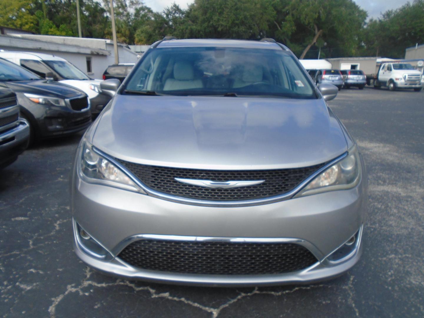 2017 Chrysler Pacifica Touring (2C4RC1BG3HR) with an 3.6L V6 DOHC 24V engine, 6A transmission, located at 6112 N Florida Avenue, Tampa, FL, 33604, (888) 521-5131, 27.954929, -82.459534 - Photo#1