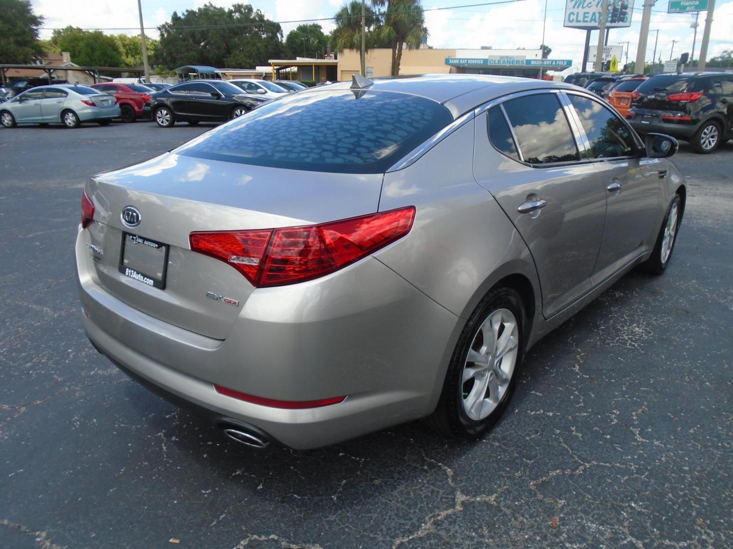 2012 Kia Optima EX (5XXGN4A75CG) with an 2.4L L4 DOHC 16V engine, 6-Speed Automatic transmission, located at 6112 N Florida Avenue, Tampa, FL, 33604, (888) 521-5131, 27.954929, -82.459534 - Photo#4