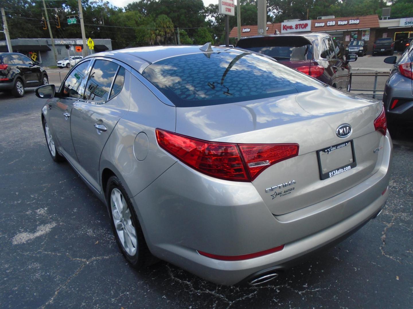 2012 Kia Optima EX (5XXGN4A75CG) with an 2.4L L4 DOHC 16V engine, 6-Speed Automatic transmission, located at 6112 N Florida Avenue, Tampa, FL, 33604, (888) 521-5131, 27.954929, -82.459534 - Photo#5