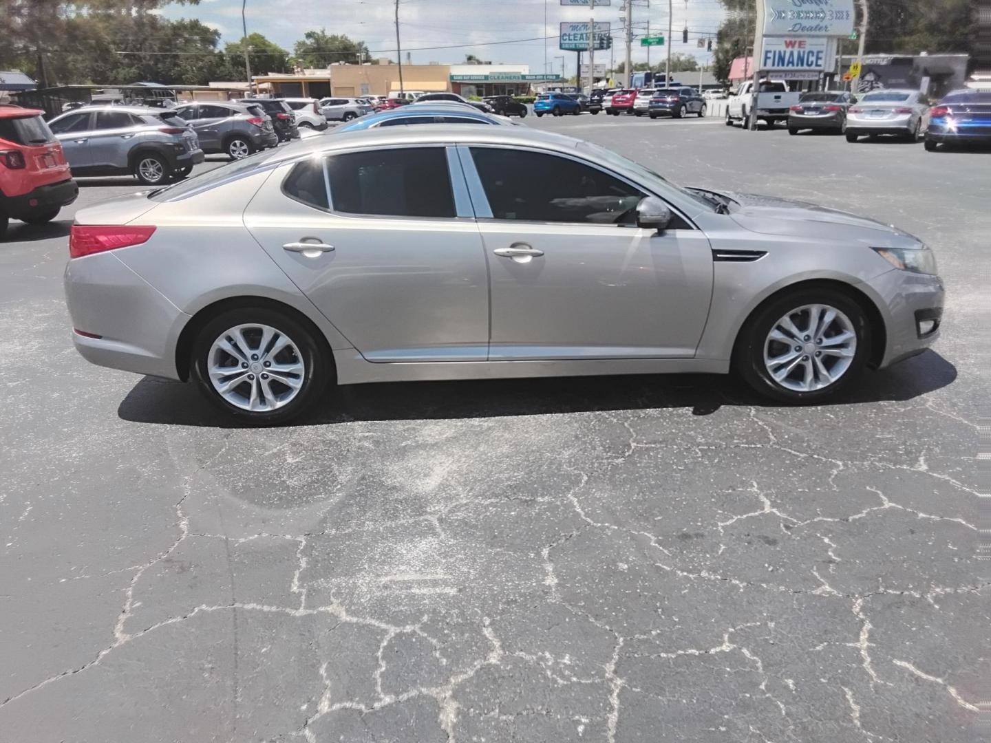 2012 SILVER /Beige Kia Optima EX (5XXGN4A75CG) with an 2.4L L4 DOHC 16V engine, 6-Speed Automatic transmission, located at 6112 N Florida Avenue, Tampa, FL, 33604, (888) 521-5131, 27.954929, -82.459534 - $499 down plus tax & tag.- Photo#4