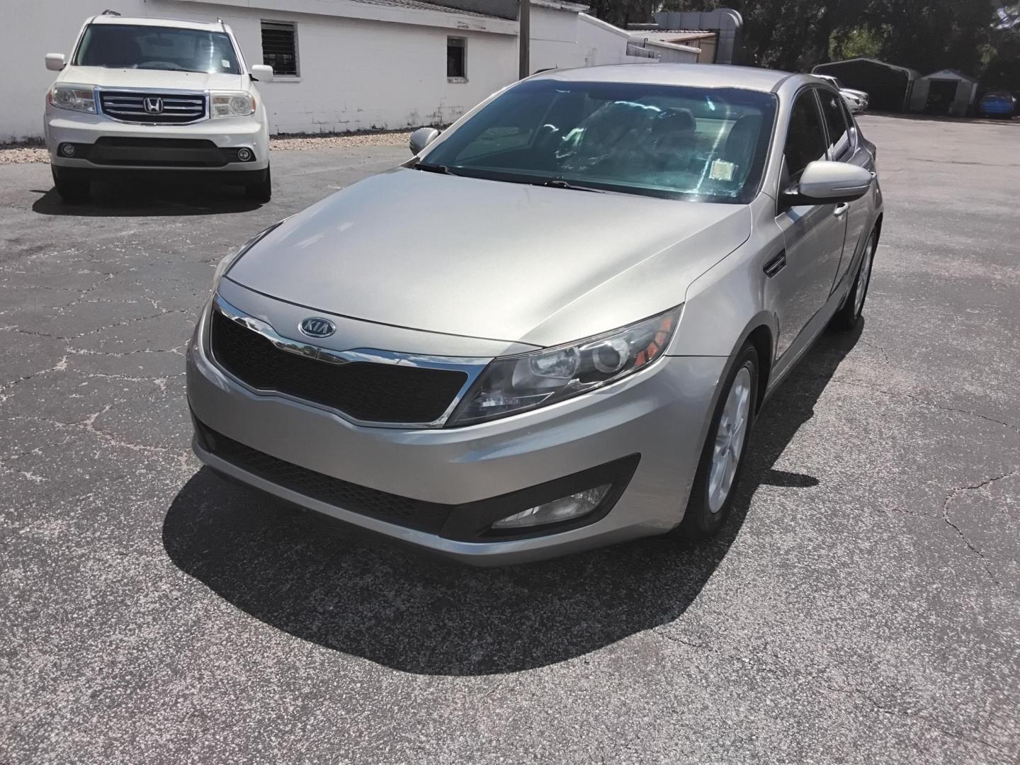 2012 SILVER /Beige Kia Optima EX (5XXGN4A75CG) with an 2.4L L4 DOHC 16V engine, 6-Speed Automatic transmission, located at 6112 N Florida Avenue, Tampa, FL, 33604, (888) 521-5131, 27.954929, -82.459534 - $499 down plus tax & tag.- Photo#1