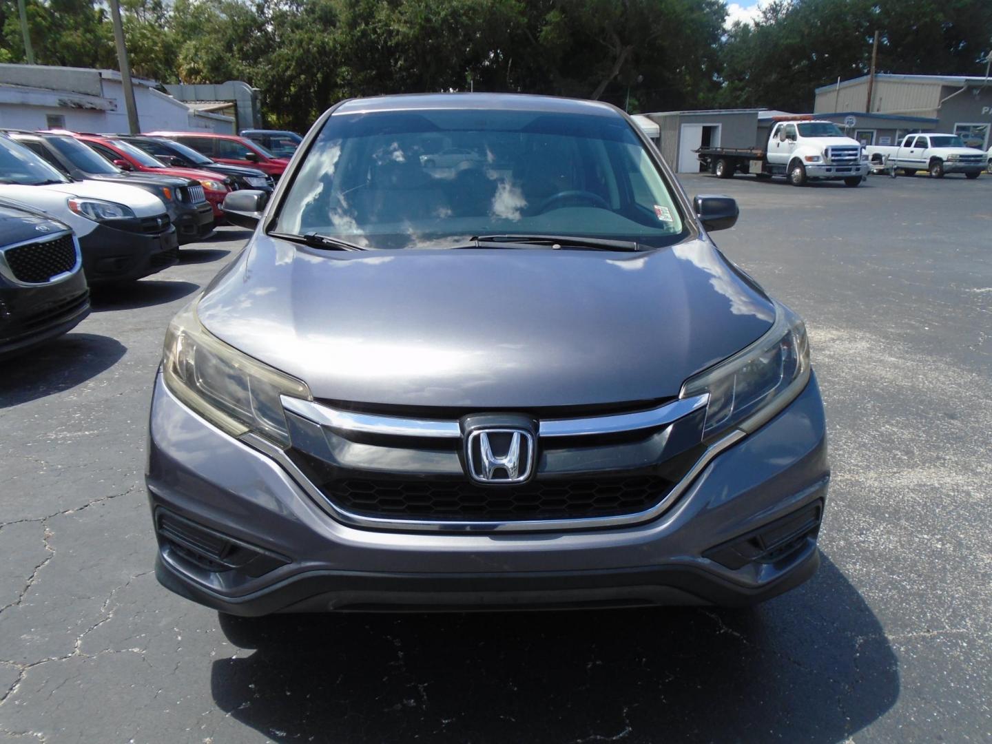 2015 Honda CR-V LX 2WD (3CZRM3H35FG) with an 2.4L L4 DOHC 16V engine, Continuously Variable Transmission transmission, located at 6112 N Florida Avenue, Tampa, FL, 33604, (888) 521-5131, 27.954929, -82.459534 - Photo#1