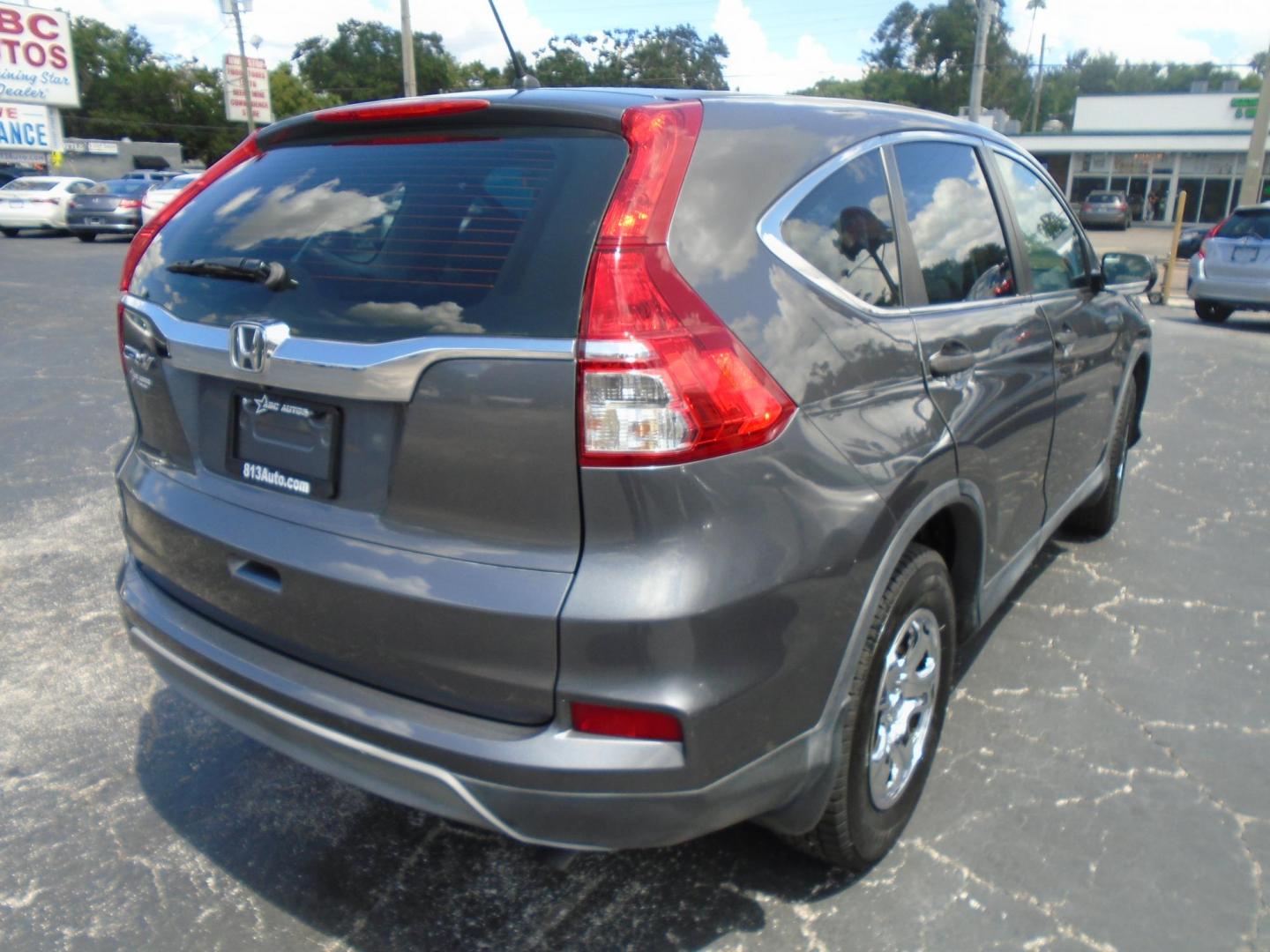 2015 Honda CR-V LX 2WD (3CZRM3H35FG) with an 2.4L L4 DOHC 16V engine, Continuously Variable Transmission transmission, located at 6112 N Florida Avenue, Tampa, FL, 33604, (888) 521-5131, 27.954929, -82.459534 - Photo#3