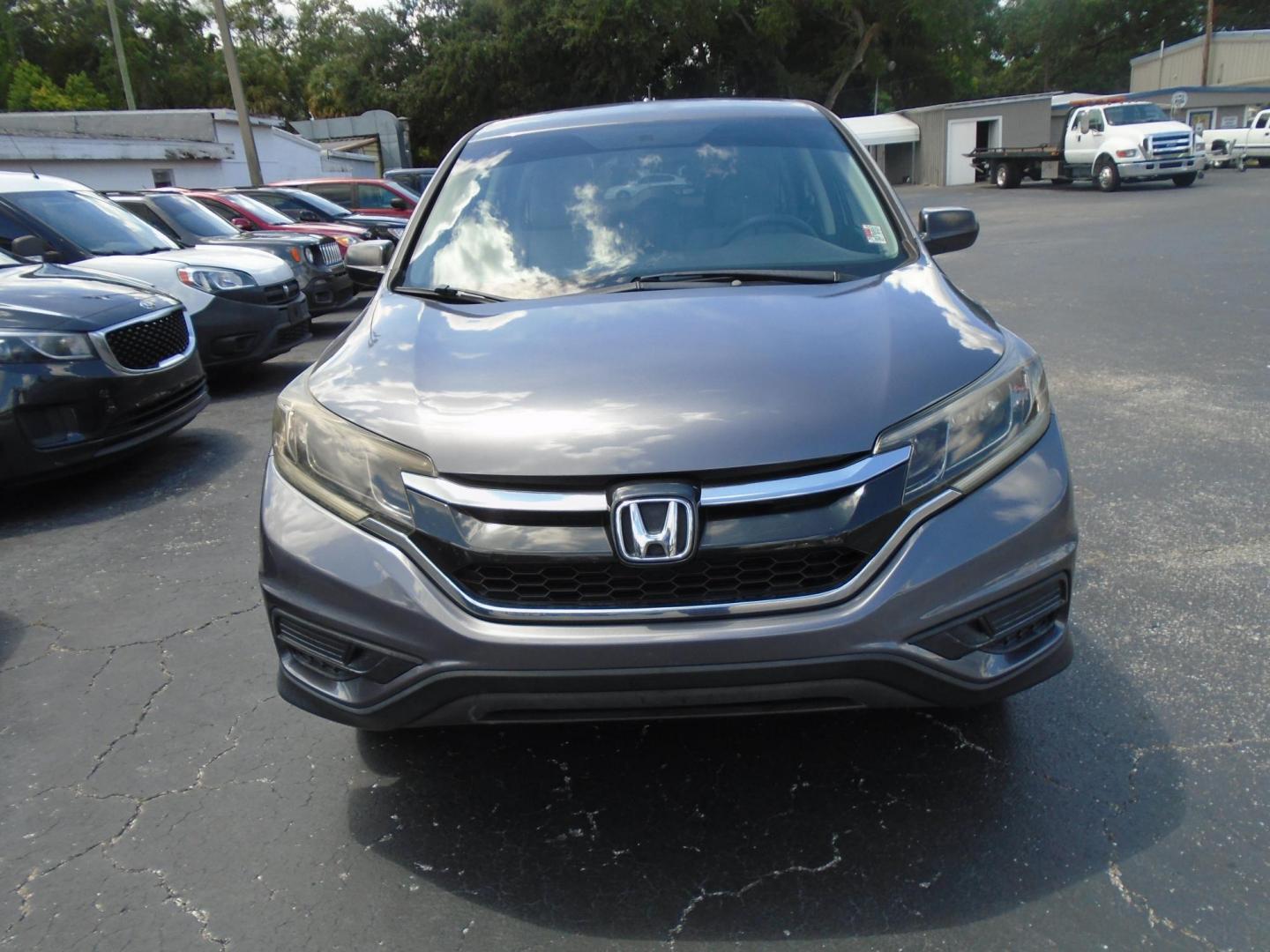 2015 Honda CR-V LX 2WD (3CZRM3H35FG) with an 2.4L L4 DOHC 16V engine, Continuously Variable Transmission transmission, located at 6112 N Florida Avenue, Tampa, FL, 33604, (888) 521-5131, 27.954929, -82.459534 - Photo#6