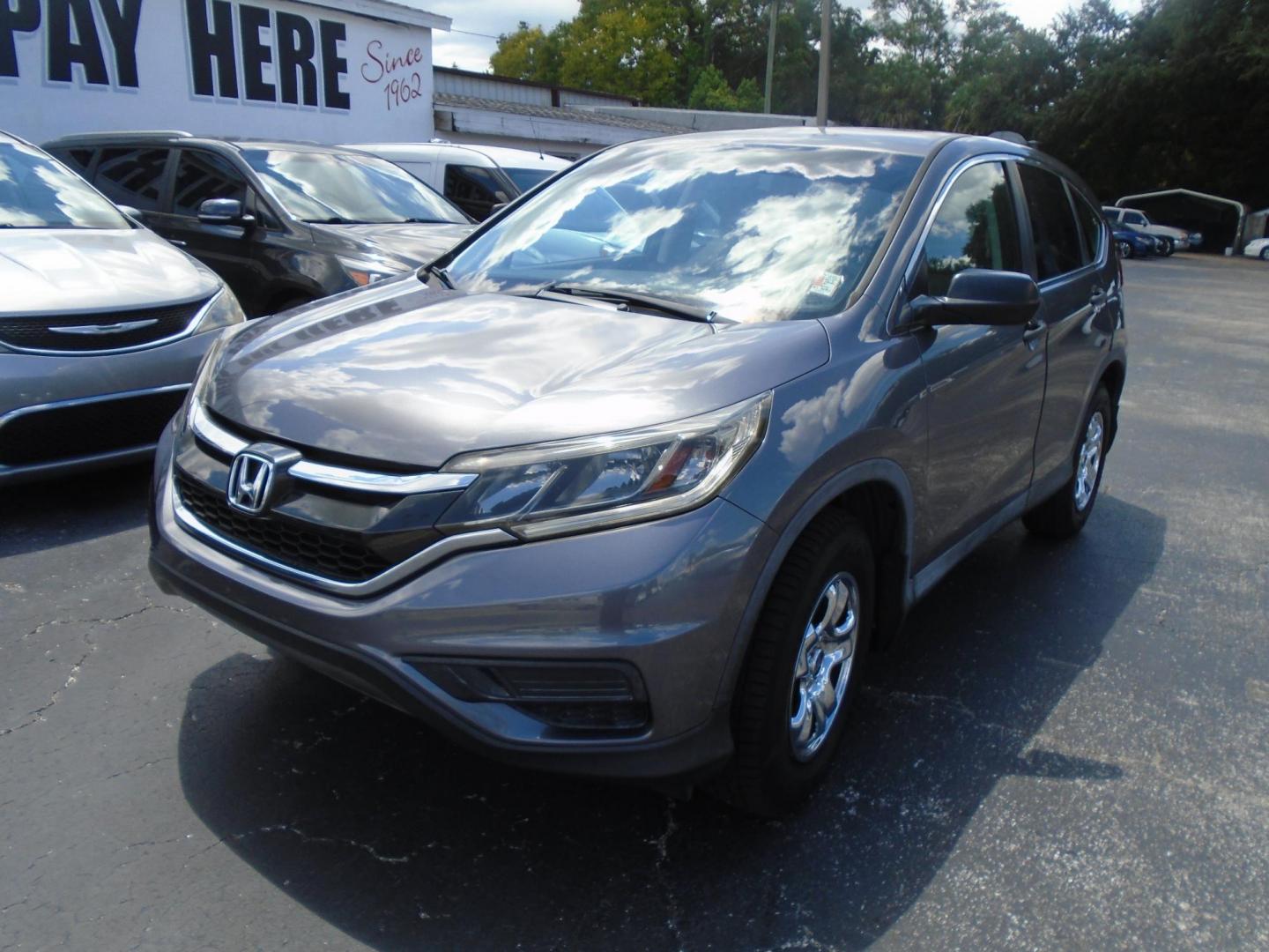 2015 Honda CR-V LX 2WD (3CZRM3H35FG) with an 2.4L L4 DOHC 16V engine, Continuously Variable Transmission transmission, located at 6112 N Florida Avenue, Tampa, FL, 33604, (888) 521-5131, 27.954929, -82.459534 - Photo#7