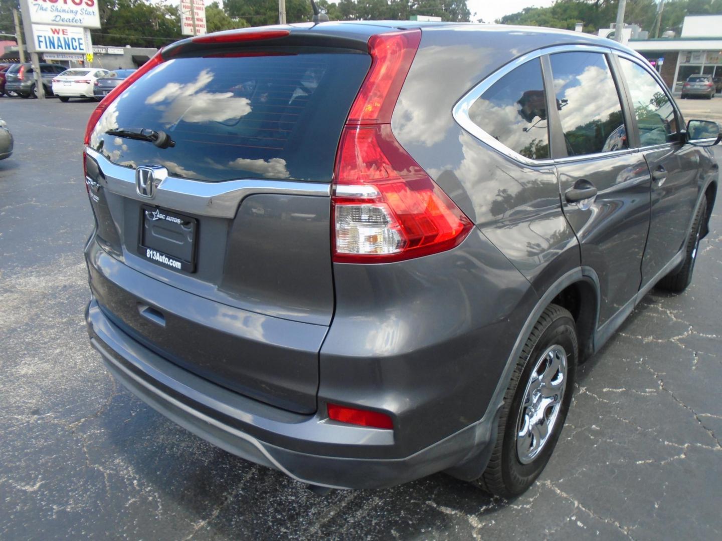 2015 Honda CR-V LX 2WD (3CZRM3H35FG) with an 2.4L L4 DOHC 16V engine, Continuously Variable Transmission transmission, located at 6112 N Florida Avenue, Tampa, FL, 33604, (888) 521-5131, 27.954929, -82.459534 - Photo#9