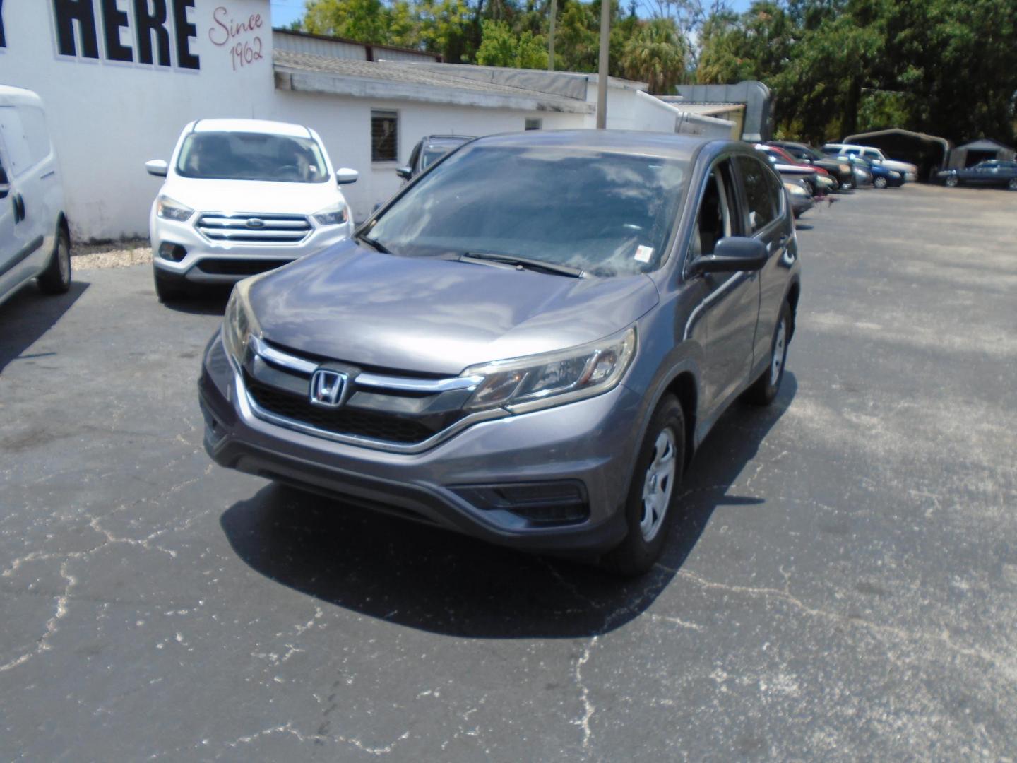 2015 Honda CR-V LX 2WD (3CZRM3H35FG) with an 2.4L L4 DOHC 16V engine, Continuously Variable Transmission transmission, located at 6112 N Florida Avenue, Tampa, FL, 33604, (888) 521-5131, 27.954929, -82.459534 - Photo#20