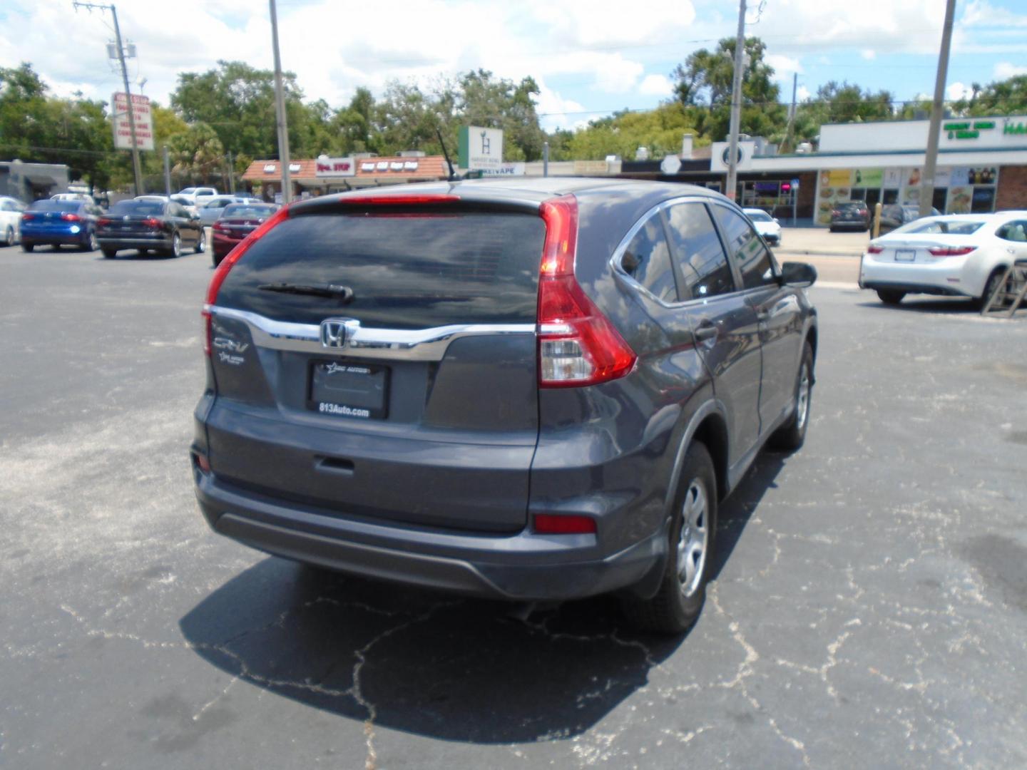 2015 Honda CR-V LX 2WD (3CZRM3H35FG) with an 2.4L L4 DOHC 16V engine, Continuously Variable Transmission transmission, located at 6112 N Florida Avenue, Tampa, FL, 33604, (888) 521-5131, 27.954929, -82.459534 - Photo#22