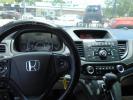 2015 Honda CR-V LX 2WD (3CZRM3H35FG) with an 2.4L L4 DOHC 16V engine, Continuously Variable Transmission transmission, located at 6112 N Florida Avenue, Tampa, FL, 33604, (888) 521-5131, 27.954929, -82.459534 - Photo#3
