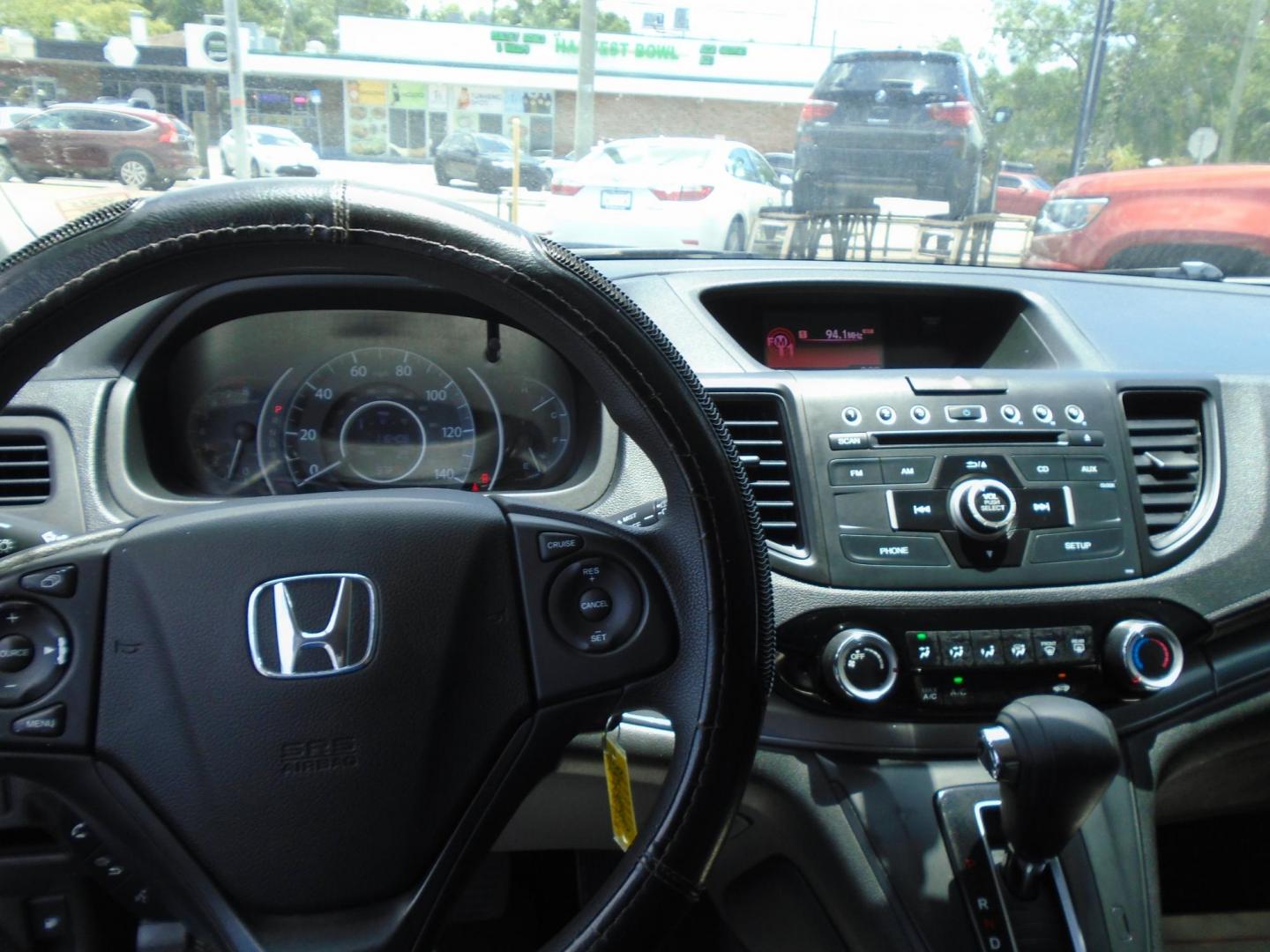 2015 Honda CR-V LX 2WD (3CZRM3H35FG) with an 2.4L L4 DOHC 16V engine, Continuously Variable Transmission transmission, located at 6112 N Florida Avenue, Tampa, FL, 33604, (888) 521-5131, 27.954929, -82.459534 - Photo#3