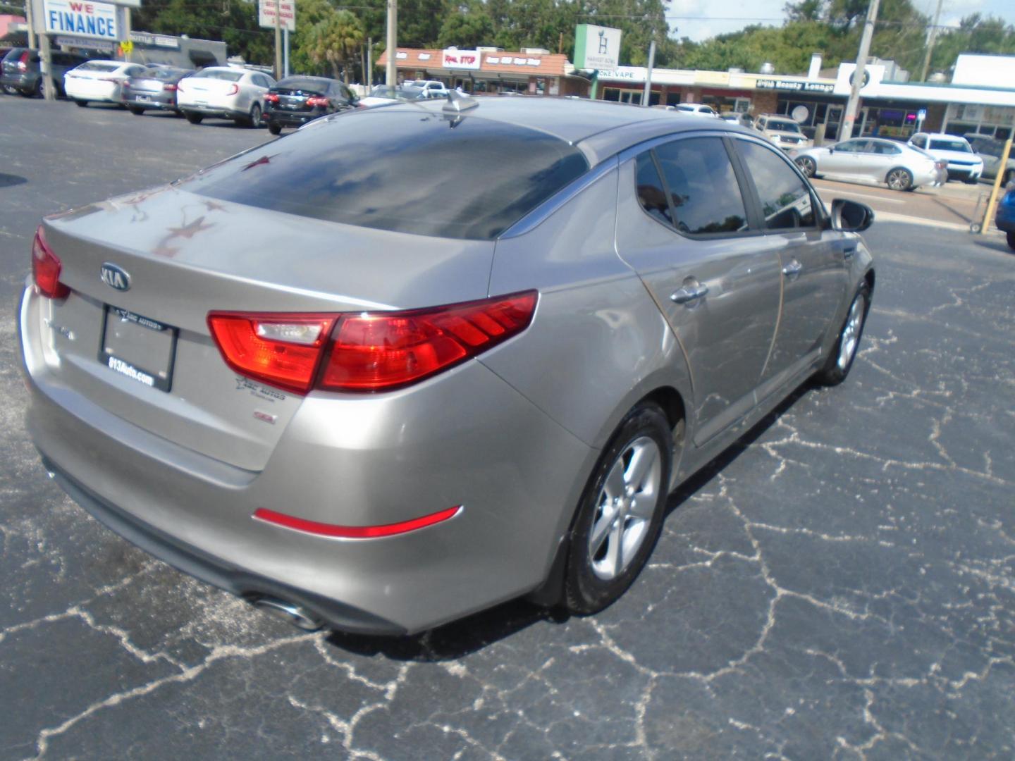 2015 Kia Optima LX (5XXGM4A79FG) with an 2.4L L4 DOHC 16V engine, 6-Speed Automatic transmission, located at 6112 N Florida Avenue, Tampa, FL, 33604, (888) 521-5131, 27.954929, -82.459534 - Photo#4