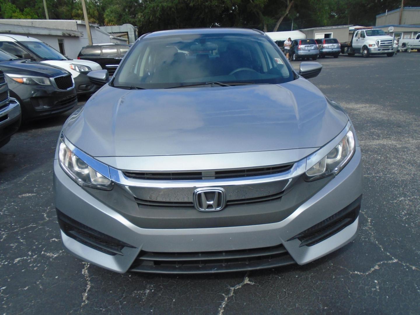 2016 Honda Civic LX Sedan CVT (19XFC2F50GE) with an 2.0L L4 DOHC 16V engine, CVT transmission, located at 6112 N Florida Avenue, Tampa, FL, 33604, (888) 521-5131, 27.954929, -82.459534 - Photo#1