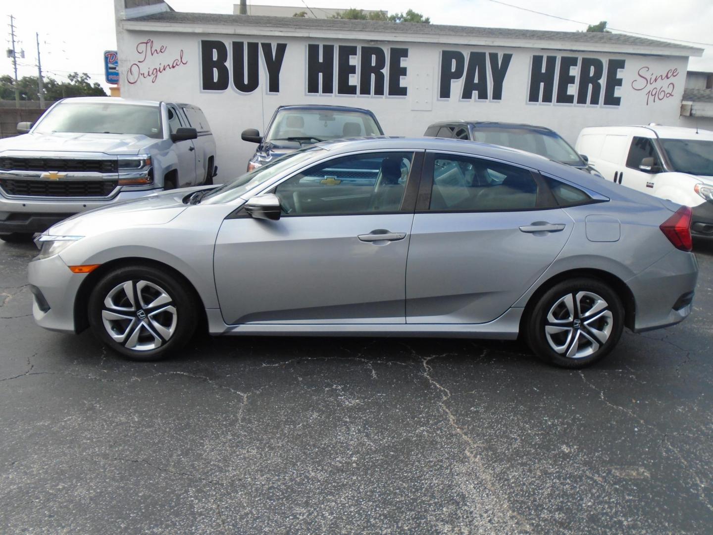 2016 Honda Civic LX Sedan CVT (19XFC2F50GE) with an 2.0L L4 DOHC 16V engine, CVT transmission, located at 6112 N Florida Avenue, Tampa, FL, 33604, (888) 521-5131, 27.954929, -82.459534 - Photo#0