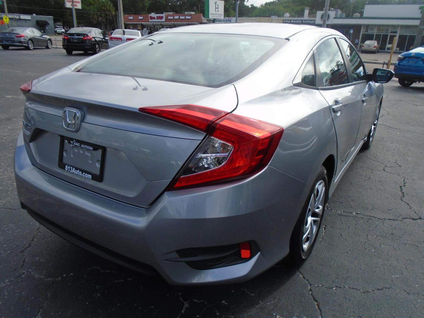 2016 Honda Civic LX Sedan CVT (19XFC2F50GE) with an 2.0L L4 DOHC 16V engine, CVT transmission, located at 6112 N Florida Avenue, Tampa, FL, 33604, (888) 521-5131, 27.954929, -82.459534 - Photo#4