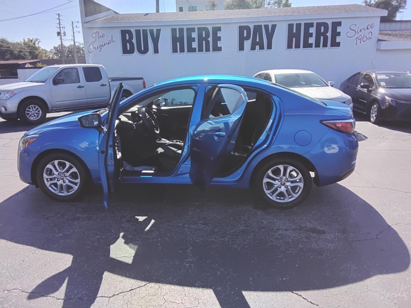 2017 BLUE /Grey Scion Yaris iA 6M (3MYDLBYV1HY) with an 1.5L L4 DOHC 16V engine, 6M transmission, located at 6112 N Florida Avenue, Tampa, FL, 33604, (888) 521-5131, 27.954929, -82.459534 - $499 down plus tax & tag. - Photo#1