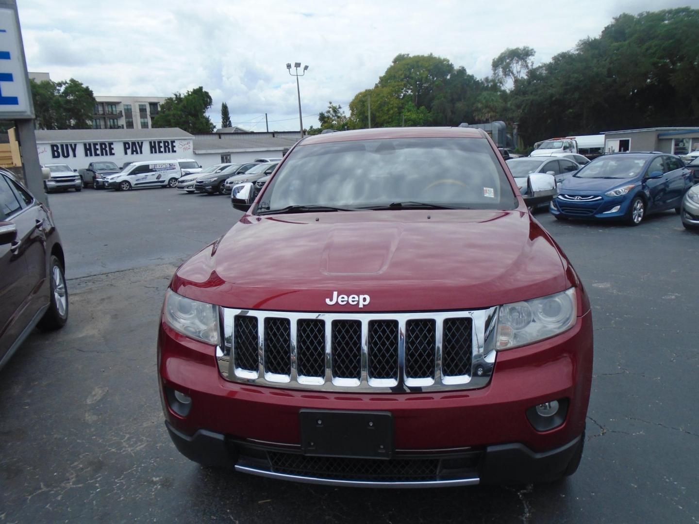 2013 Jeep Grand Cherokee Overland 4WD (1C4RJFCG7DC) with an 3.6L V6 DOHC 24V engine, 5-Speed Automatic transmission, located at 6112 N Florida Avenue, Tampa, FL, 33604, (888) 521-5131, 27.954929, -82.459534 - Photo#1