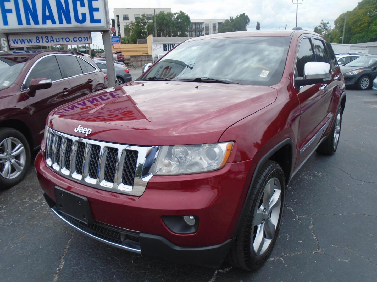 2013 Jeep Grand Cherokee Overland 4WD (1C4RJFCG7DC) with an 3.6L V6 DOHC 24V engine, 5-Speed Automatic transmission, located at 6112 N Florida Avenue, Tampa, FL, 33604, (888) 521-5131, 27.954929, -82.459534 - Photo#2