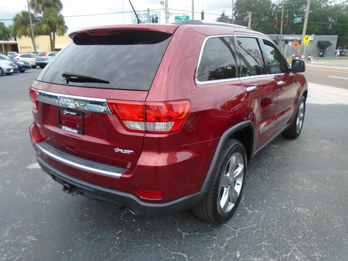 2013 Jeep Grand Cherokee Overland 4WD (1C4RJFCG7DC) with an 3.6L V6 DOHC 24V engine, 5-Speed Automatic transmission, located at 6112 N Florida Avenue, Tampa, FL, 33604, (888) 521-5131, 27.954929, -82.459534 - Photo#5