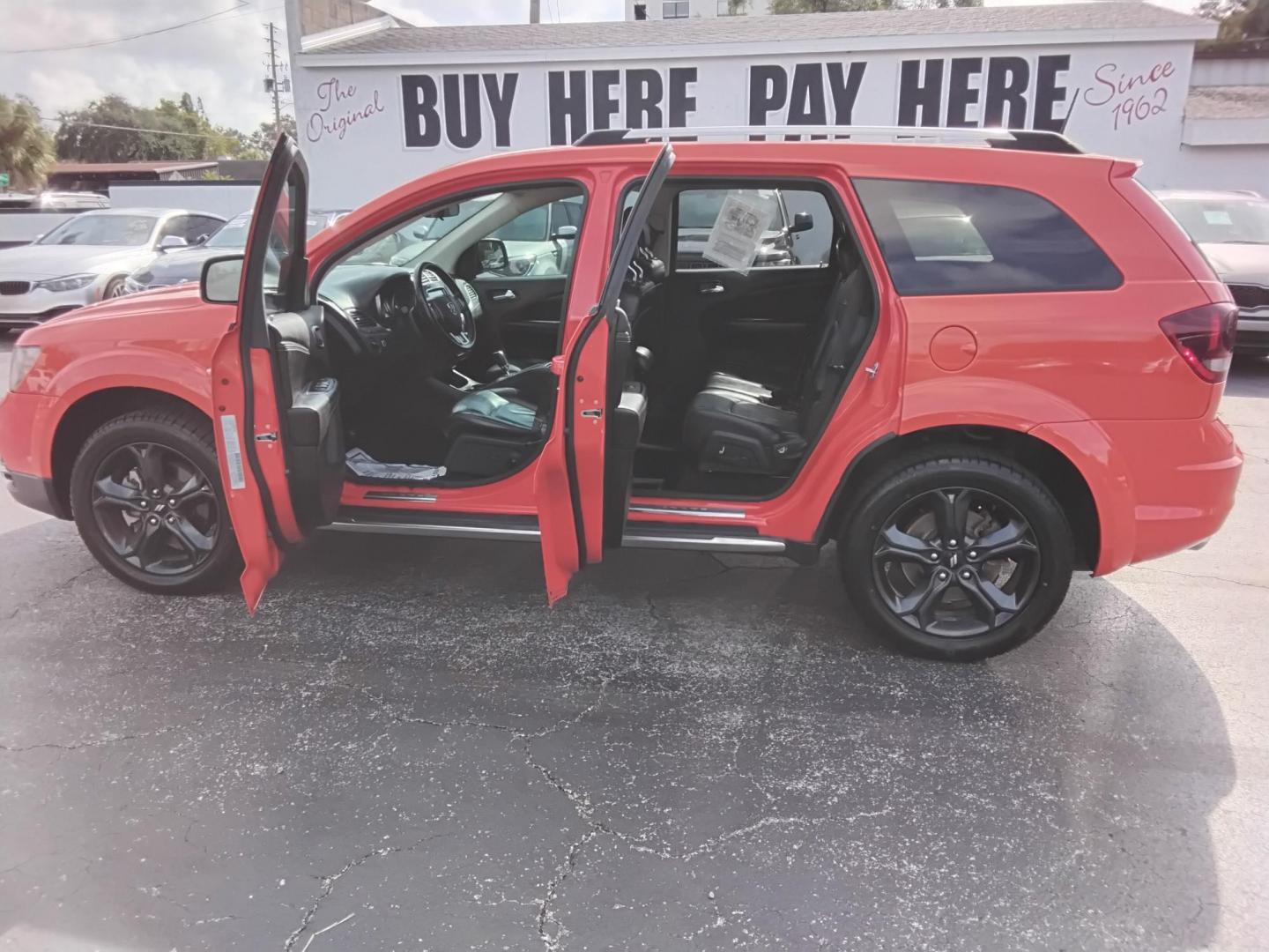 2018 Orange /Black Dodge Journey Crossroad FWD (3C4PDCGG6JT) with an 3.6L V6 DOHC 24V engine, 4A transmission, located at 6112 N Florida Avenue, Tampa, FL, 33604, (888) 521-5131, 27.954929, -82.459534 - 499$ down plus tax & tag. - Photo#1