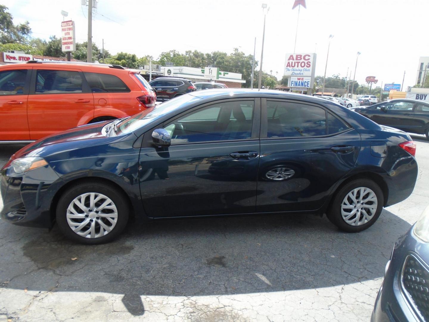 2018 Toyota Corolla XLE CVT (2T1BURHE4JC) with an 1.8L L4 DOHC 16V engine, CVT transmission, located at 6112 N Florida Avenue, Tampa, FL, 33604, (888) 521-5131, 27.954929, -82.459534 - Photo#1