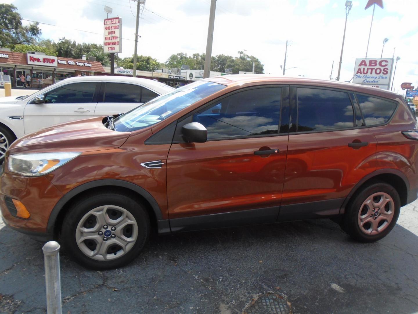 2017 Ford Escape S FWD (1FMCU0F75HU) with an 2.5L L4 DOHC 16V engine, 6A transmission, located at 6112 N Florida Avenue, Tampa, FL, 33604, (888) 521-5131, 27.954929, -82.459534 - Photo#2