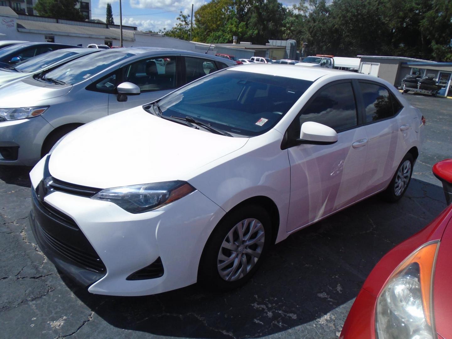 2018 Toyota Corolla SE 6M (5YFBURHE4JP) with an 1.8L L4 DOHC 16V engine, 6M transmission, located at 6112 N Florida Avenue, Tampa, FL, 33604, (888) 521-5131, 27.954929, -82.459534 - Photo#0