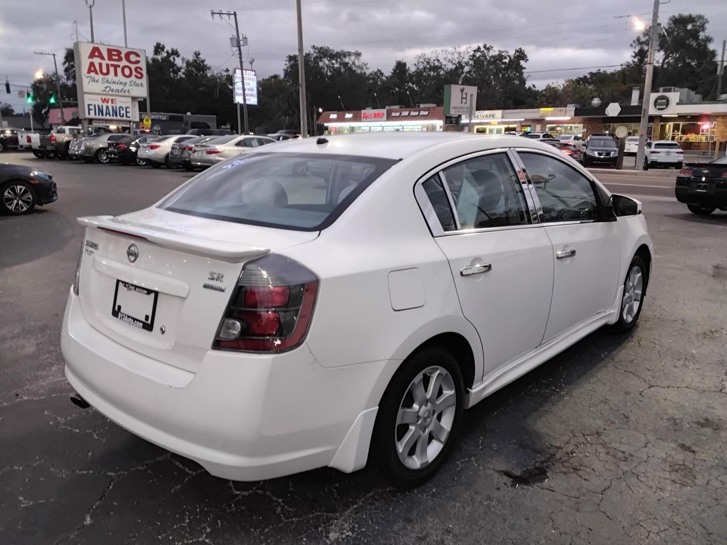 2012 White /Grey Nissan Sentra 2.0 (3N1AB6AP1CL) with an 2.0L L4 DOHC 16V engine, Continuously Variable Transmission transmission, located at 6112 N Florida Avenue, Tampa, FL, 33604, (888) 521-5131, 27.954929, -82.459534 - $499 DOWN PLUS TAX & TAG. - Photo#5