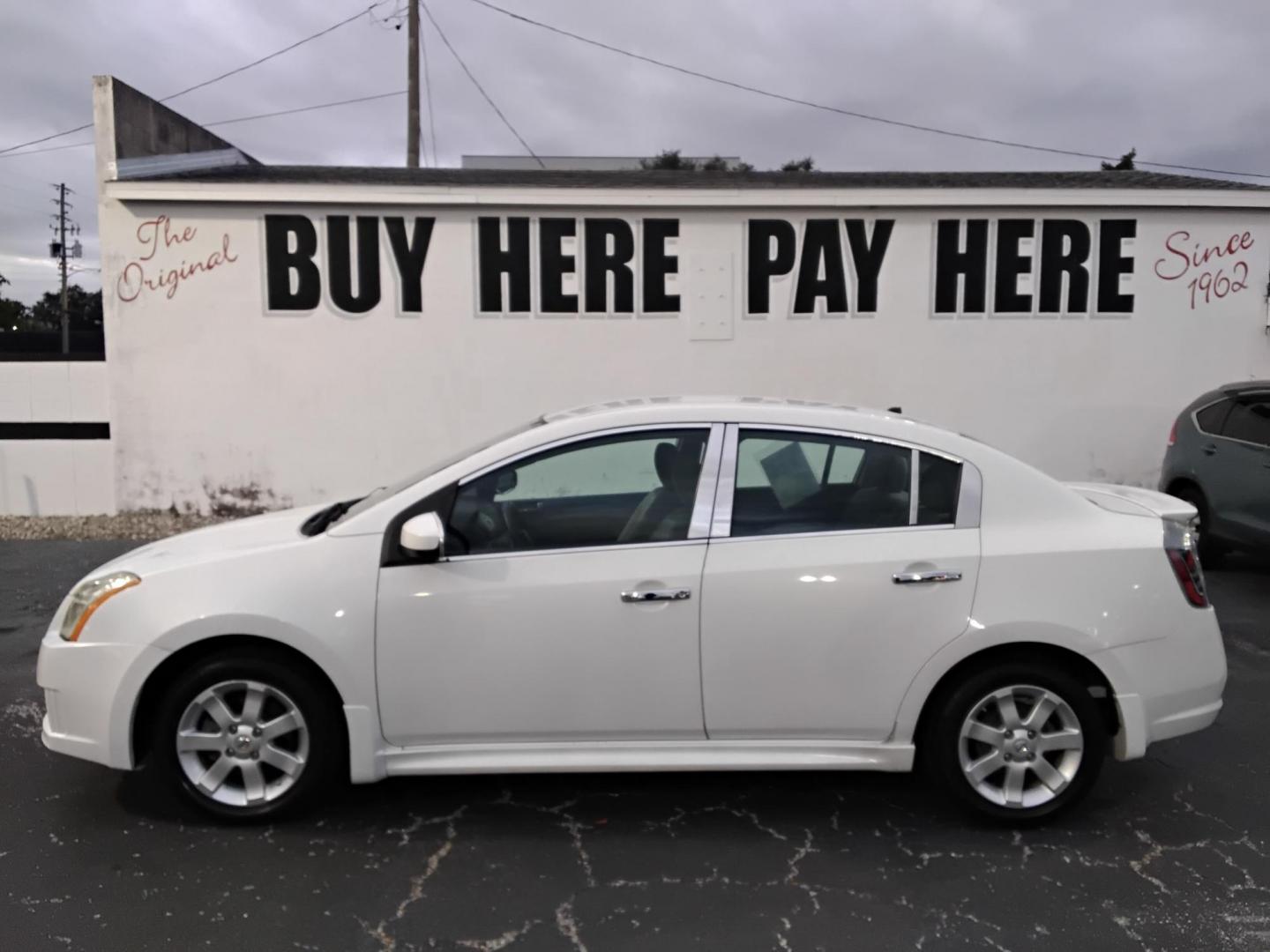 2012 White /Grey Nissan Sentra 2.0 (3N1AB6AP1CL) with an 2.0L L4 DOHC 16V engine, Continuously Variable Transmission transmission, located at 6112 N Florida Avenue, Tampa, FL, 33604, (888) 521-5131, 27.954929, -82.459534 - $499 DOWN PLUS TAX & TAG. - Photo#0