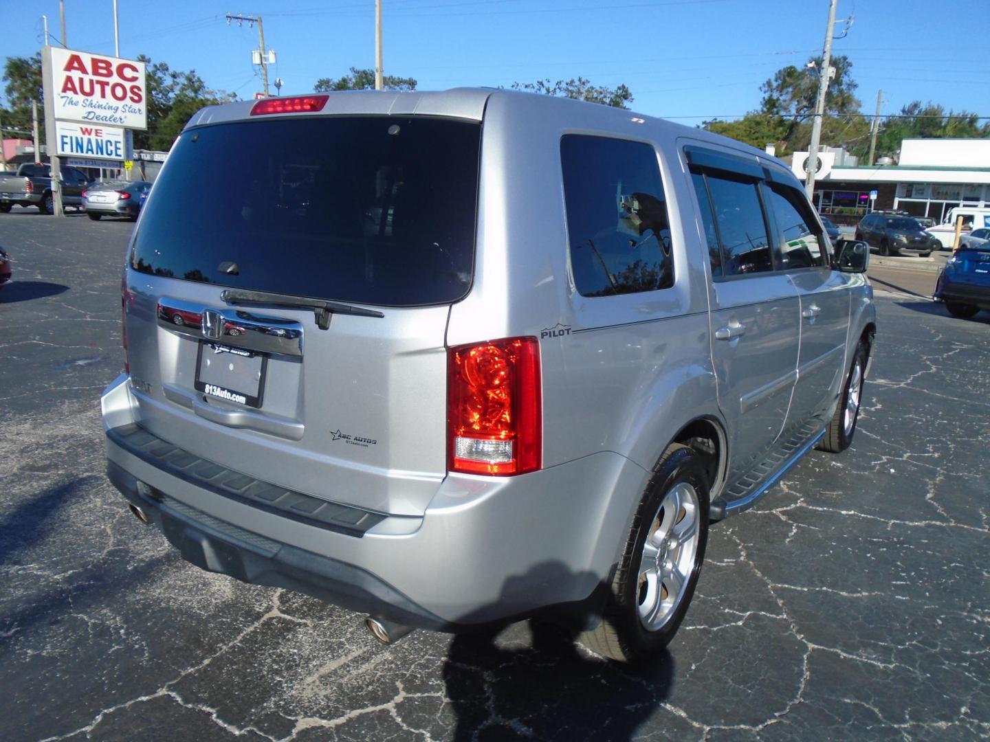 2013 Honda Pilot EX-L 2WD 5-Spd AT with Navigation (5FNYF3H77DB) with an 3.5L V6 SOHC 24V engine, 5-Speed Automatic transmission, located at 6112 N Florida Avenue, Tampa, FL, 33604, (888) 521-5131, 27.954929, -82.459534 - Photo#5