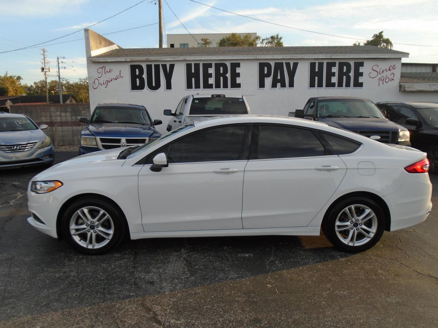 2018 Ford Fusion SE (3FA6P0H76JR) with an 2.5L L4 DOHC 16V engine, 6A transmission, located at 6112 N Florida Avenue, Tampa, FL, 33604, (888) 521-5131, 27.954929, -82.459534 - Photo#0