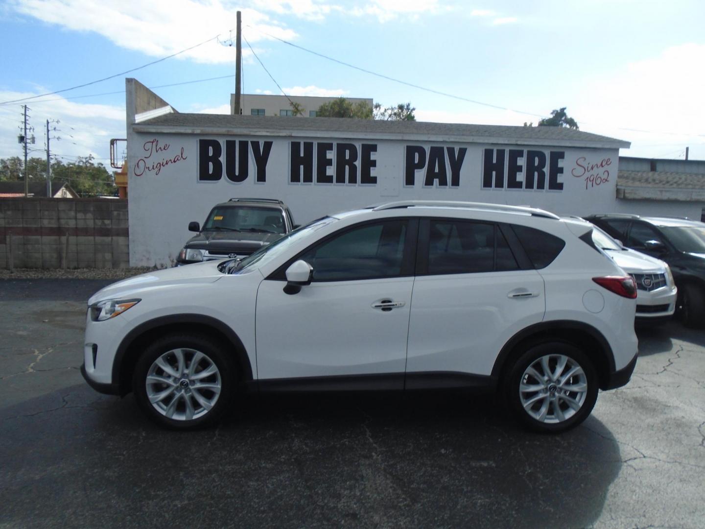 2014 Mazda CX-5 Grand Touring (JM3KE2DY9E0) with an 2.5L L4 DOHC 16V engine, 6-Speed Automatic transmission, located at 6112 N Florida Avenue, Tampa, FL, 33604, (888) 521-5131, 27.954929, -82.459534 - Photo#0