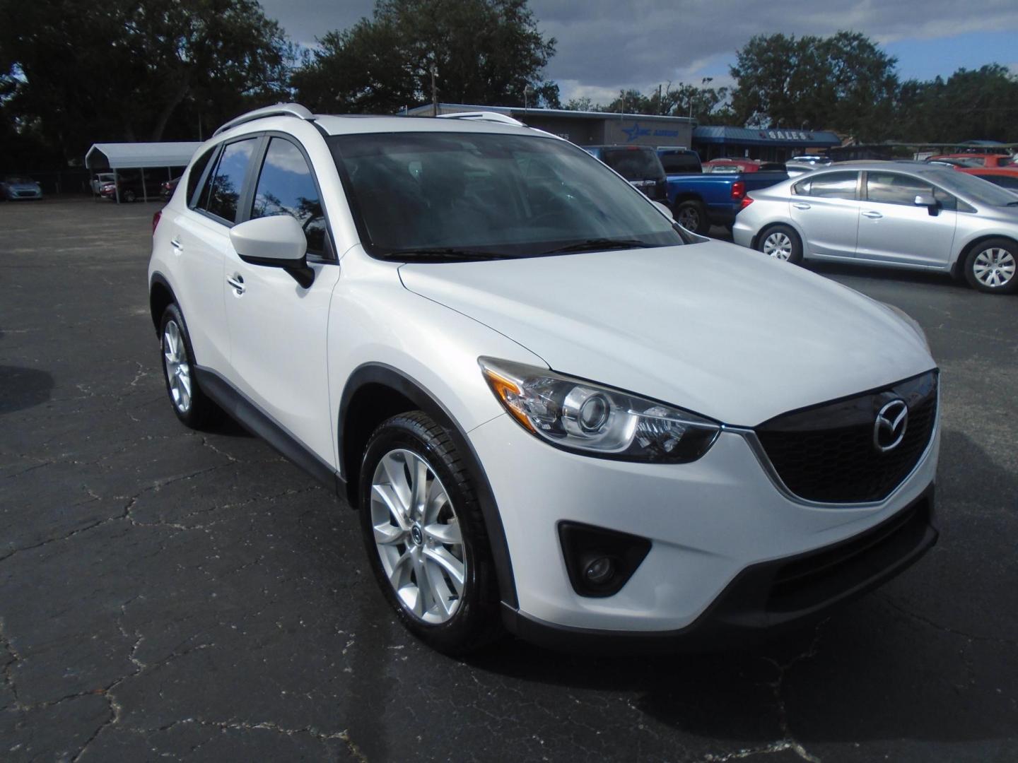 2014 Mazda CX-5 Grand Touring (JM3KE2DY9E0) with an 2.5L L4 DOHC 16V engine, 6-Speed Automatic transmission, located at 6112 N Florida Avenue, Tampa, FL, 33604, (888) 521-5131, 27.954929, -82.459534 - Photo#2