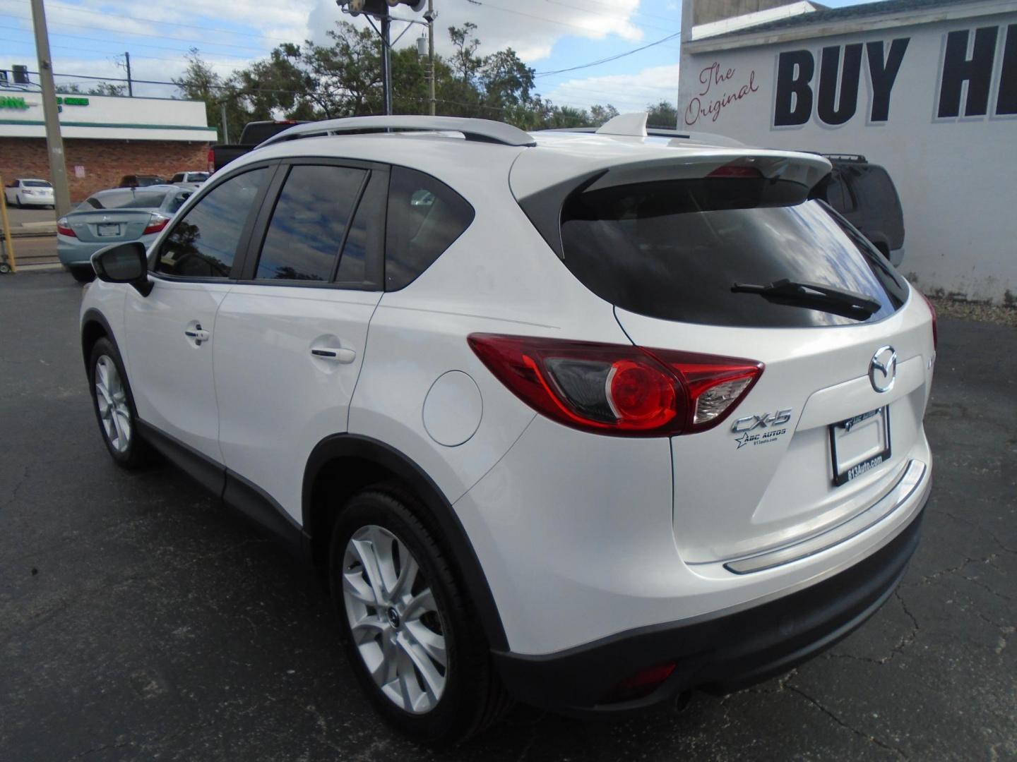 2014 Mazda CX-5 Grand Touring (JM3KE2DY9E0) with an 2.5L L4 DOHC 16V engine, 6-Speed Automatic transmission, located at 6112 N Florida Avenue, Tampa, FL, 33604, (888) 521-5131, 27.954929, -82.459534 - Photo#5