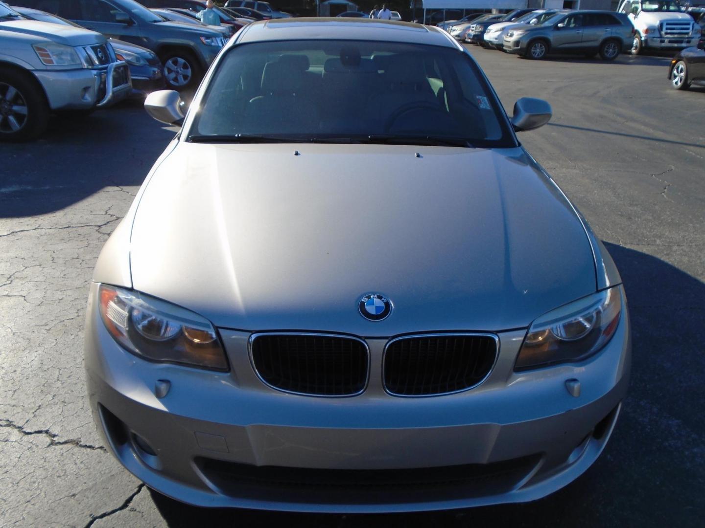 2013 BMW 1-Series 128i Coupe (WBAUP9C52DV) with an 3.0L L6 DOHC 24V engine, located at 6112 N Florida Avenue, Tampa, FL, 33604, (888) 521-5131, 27.954929, -82.459534 - Photo#1