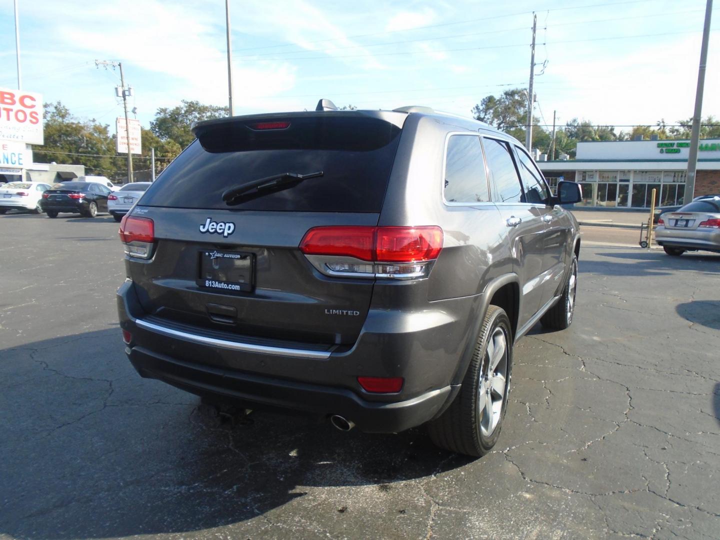 2015 Jeep Grand Cherokee Limited 2WD (1C4RJEBG3FC) with an 3.6L V6 DOHC 24V engine, 8-Speed Automatic transmission, located at 6112 N Florida Avenue, Tampa, FL, 33604, (888) 521-5131, 27.954929, -82.459534 - Photo#4