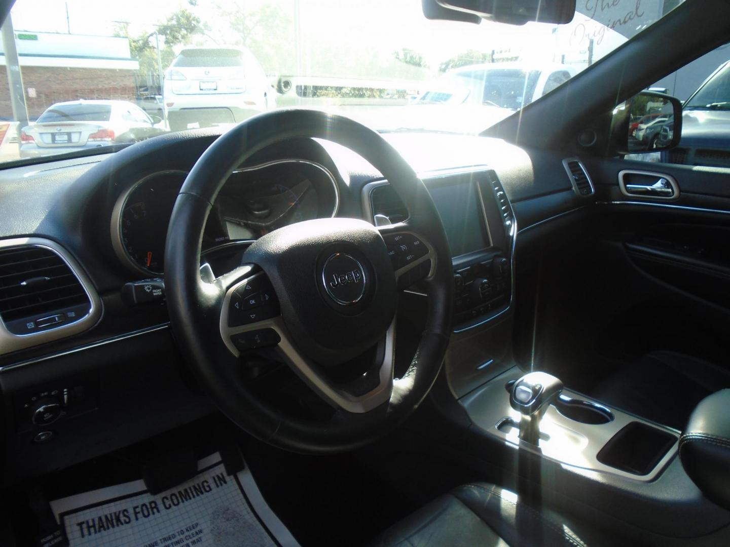 2015 Jeep Grand Cherokee Limited 2WD (1C4RJEBG3FC) with an 3.6L V6 DOHC 24V engine, 8-Speed Automatic transmission, located at 6112 N Florida Avenue, Tampa, FL, 33604, (888) 521-5131, 27.954929, -82.459534 - Photo#7