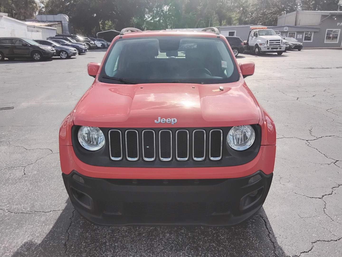 2017 ORANGE /Black Jeep Renegade Latitude FWD (ZACCJABB7HP) with an 2.4L L4 DOHC 16V engine, 6M transmission, located at 6112 N Florida Avenue, Tampa, FL, 33604, (888) 521-5131, 27.954929, -82.459534 - $499 DOWN PLUS TAX & TAG.- Photo#1