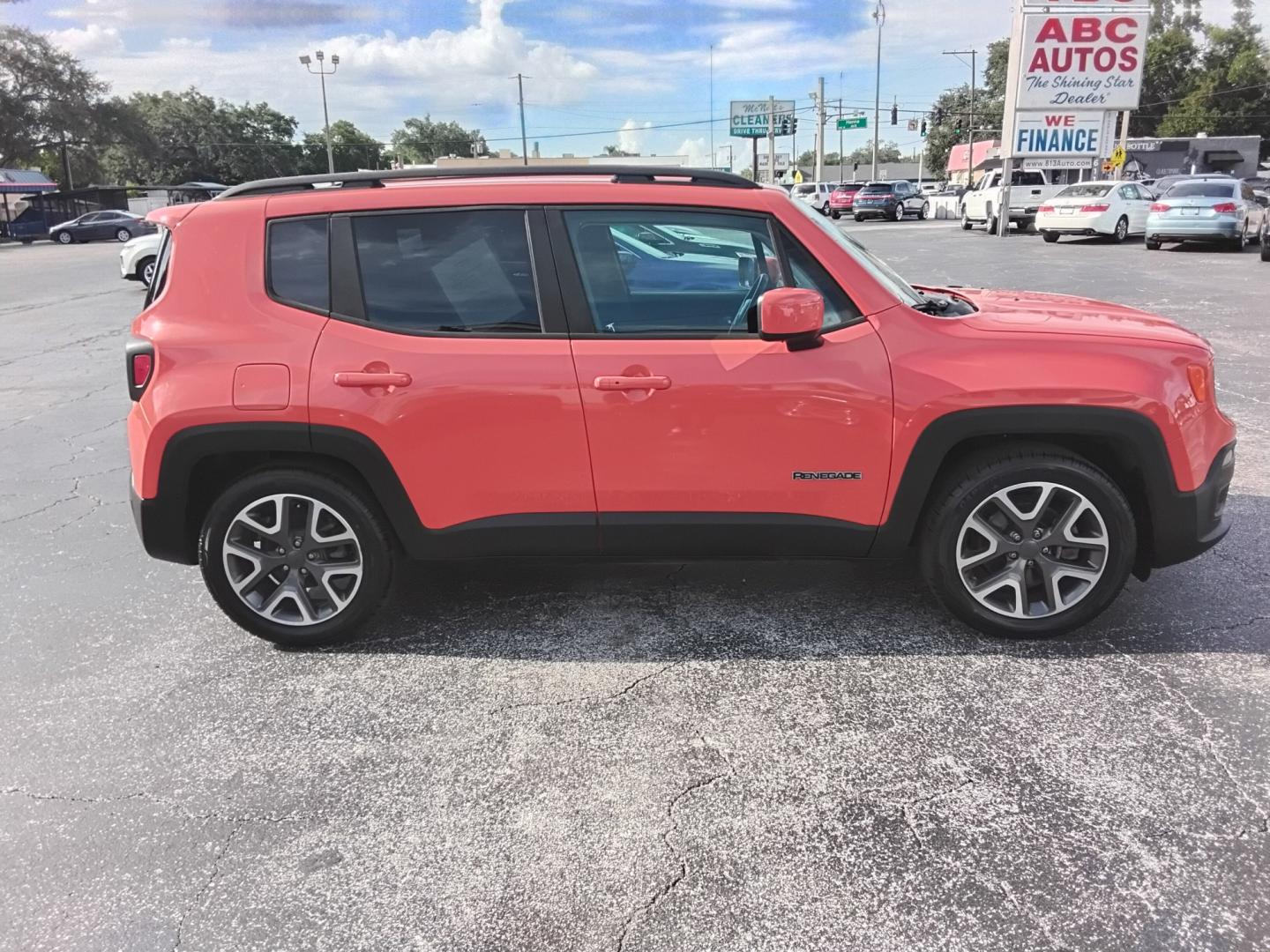 2017 ORANGE /Black Jeep Renegade Latitude FWD (ZACCJABB7HP) with an 2.4L L4 DOHC 16V engine, 6M transmission, located at 6112 N Florida Avenue, Tampa, FL, 33604, (888) 521-5131, 27.954929, -82.459534 - $499 DOWN PLUS TAX & TAG.- Photo#2