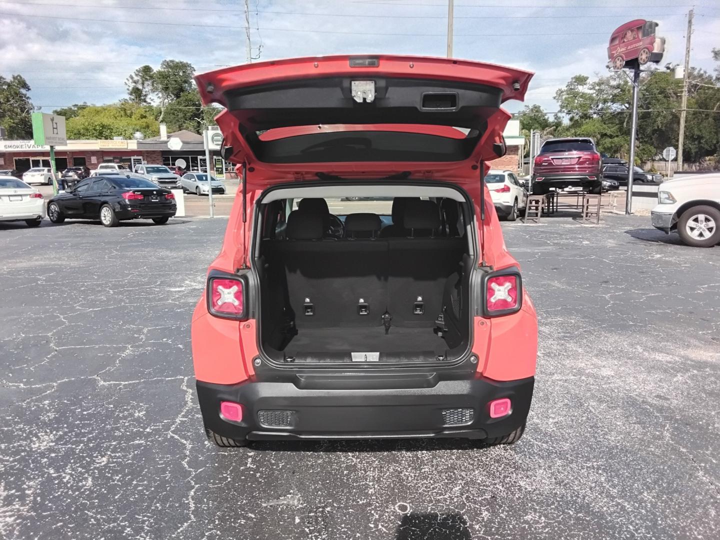 2017 ORANGE /Black Jeep Renegade Latitude FWD (ZACCJABB7HP) with an 2.4L L4 DOHC 16V engine, 6M transmission, located at 6112 N Florida Avenue, Tampa, FL, 33604, (888) 521-5131, 27.954929, -82.459534 - $499 DOWN PLUS TAX & TAG.- Photo#4