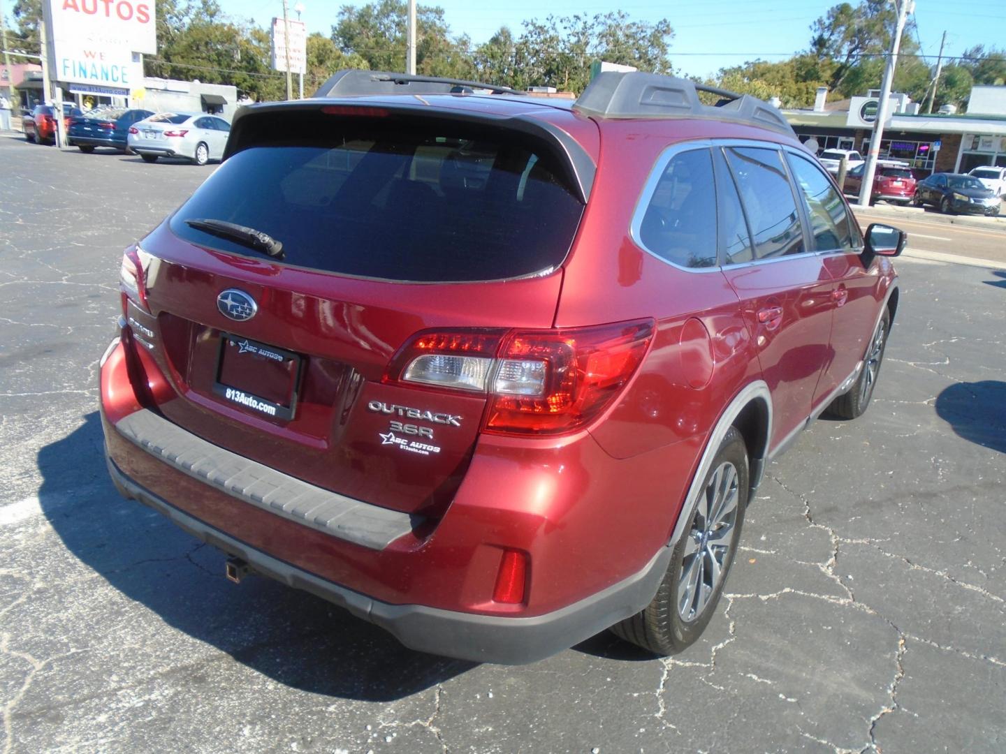 2015 Subaru Outback 3.6R Limited (4S4BSENC6F3) with an 3.6L H6 DOHC 24V engine, 6-Speed Automatic transmission, located at 6112 N Florida Avenue, Tampa, FL, 33604, (888) 521-5131, 27.954929, -82.459534 - Photo#3