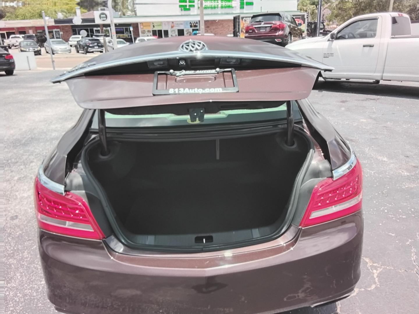 2016 RED /Beige Buick LaCrosse Base (1G4GA5G39GF) with an 3.6L V6 DOHC 24V FFV engine, 6A transmission, located at 6112 N Florida Avenue, Tampa, FL, 33604, (888) 521-5131, 27.954929, -82.459534 - $499 down plus tax.- Photo#5