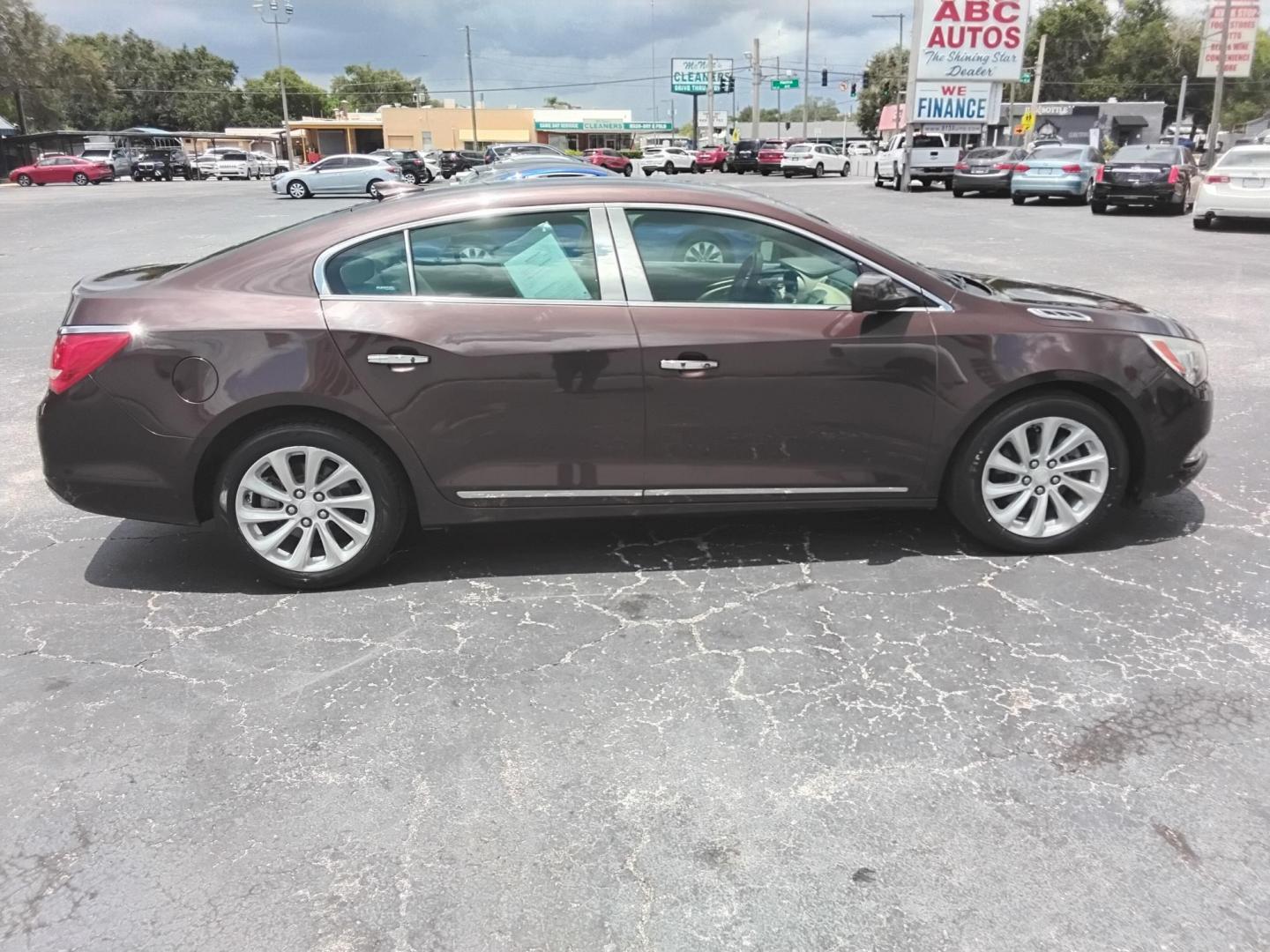 2016 RED /Beige Buick LaCrosse Base (1G4GA5G39GF) with an 3.6L V6 DOHC 24V FFV engine, 6A transmission, located at 6112 N Florida Avenue, Tampa, FL, 33604, (888) 521-5131, 27.954929, -82.459534 - $499 down plus tax.- Photo#3